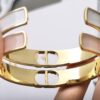 Dior D-shaped open bangle