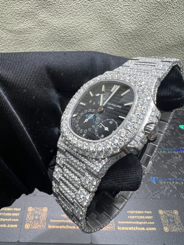 59bff7814ab47bd04af2551a7d6db4e6 0021 Patek Philippe Nautilus 5712 40mm White Plain Dial Big Stone Bezel & Case Big Stone Band