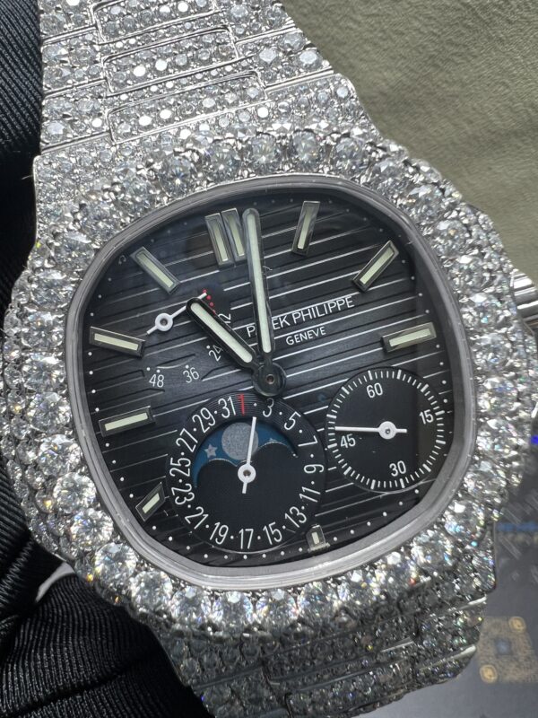 7b0255240391d8090d21b56d0efc44db 0021 Patek Philippe Nautilus 5712 40mm White Plain Dial Big Stone Bezel & Case Big Stone Band