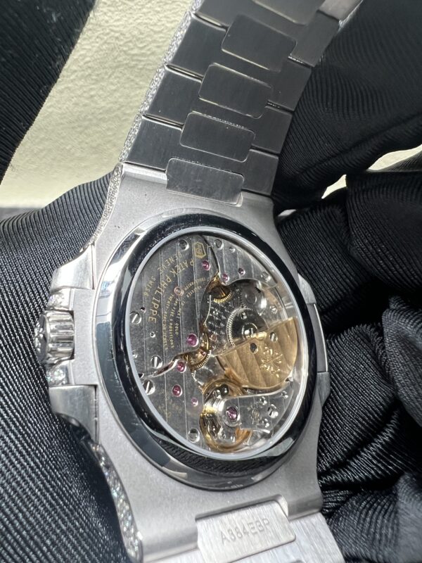 0044 Patek Philippe Nautilus 5712 40mm White Plain Dial Baguette Bezel & Baguette Band
