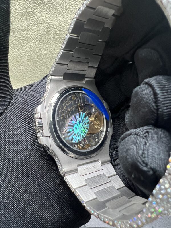 ad6f3407115376ed3bd592b6b0e01c76 0021 Patek Philippe Nautilus 5712 40mm White Plain Dial Big Stone Bezel & Case Big Stone Band